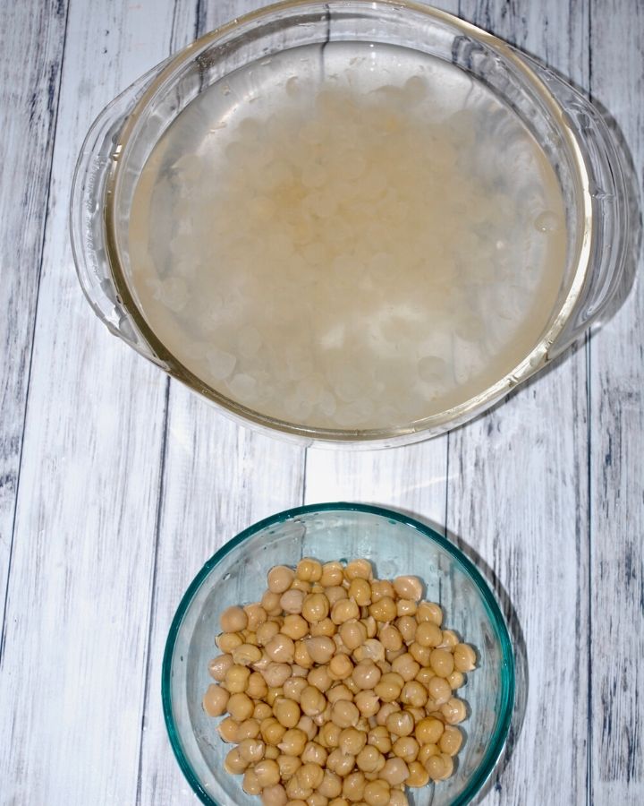 bowl of skinless chickpeas and bowl of chickpea skins in water