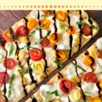 flatbread with melted mozzarella, tomato, and basil