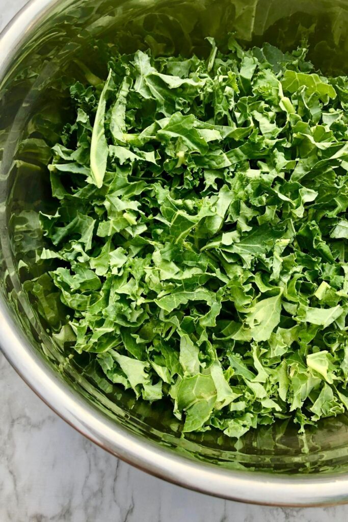 bowl of raw, shredded kale
