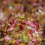 mini cheeseball coated in cranberries and pistachios