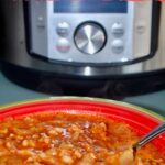bowl of cabbage turkey soup with instant pot in background