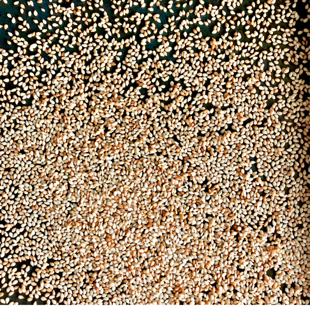 toasted sesame seeds on a baking sheet