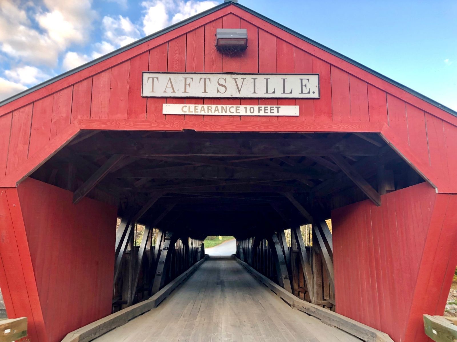 A red covered bridge that reads Taftsville