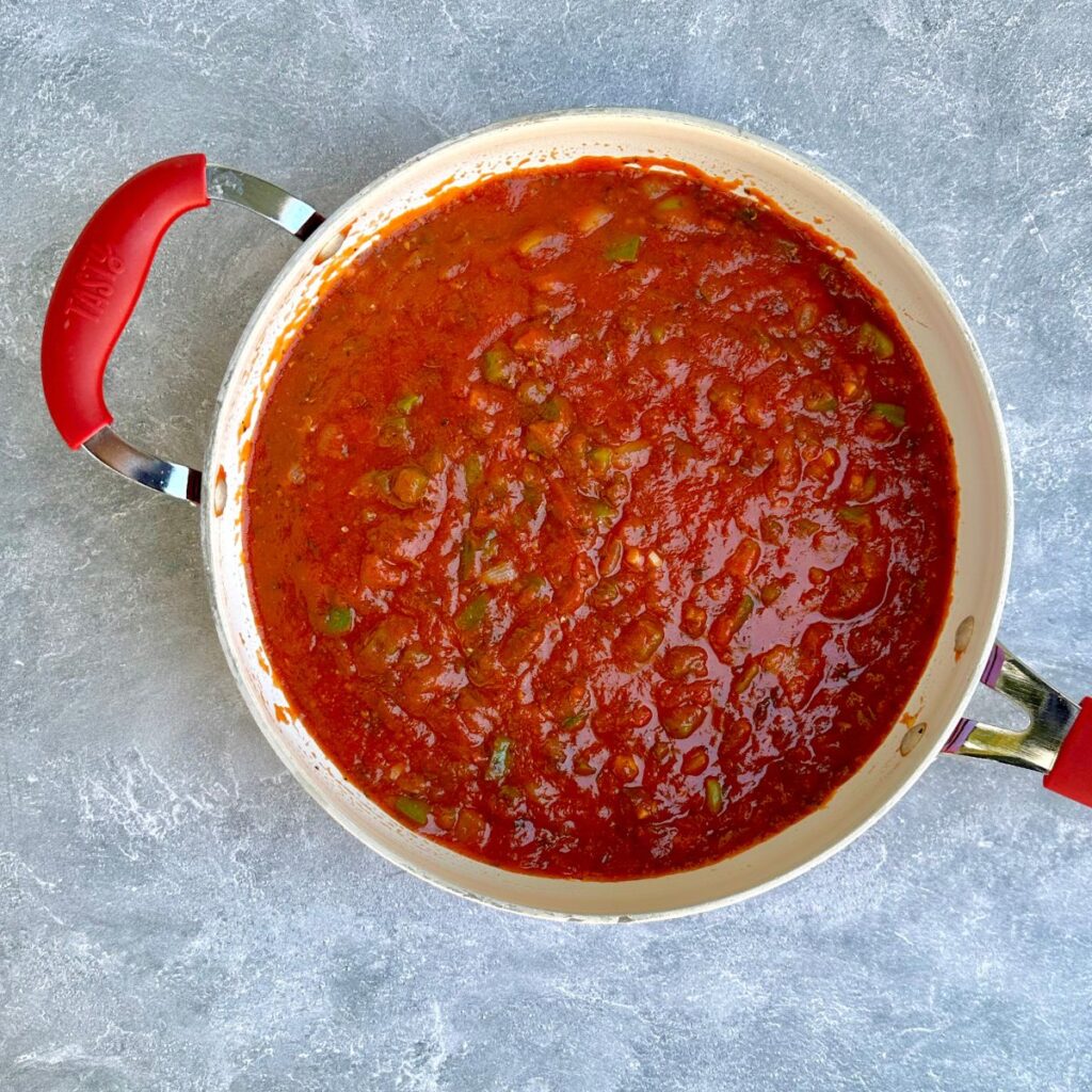 marinara sauce in a large frying pan.